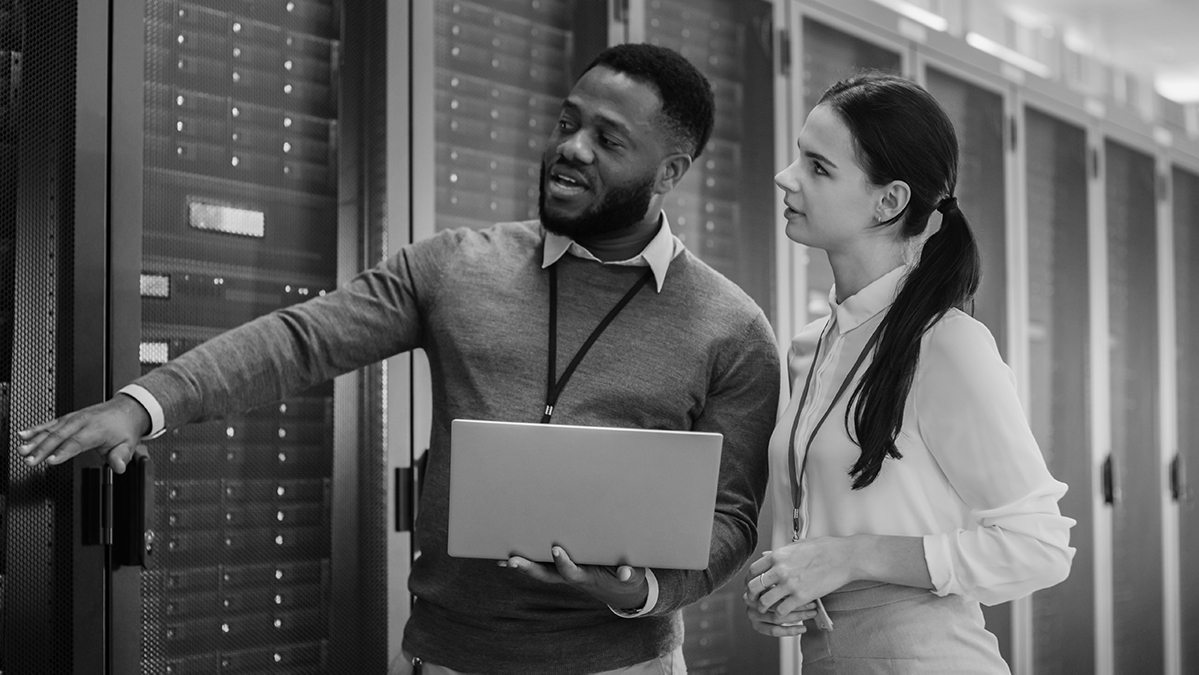 IT specialist explaining a server room to a client